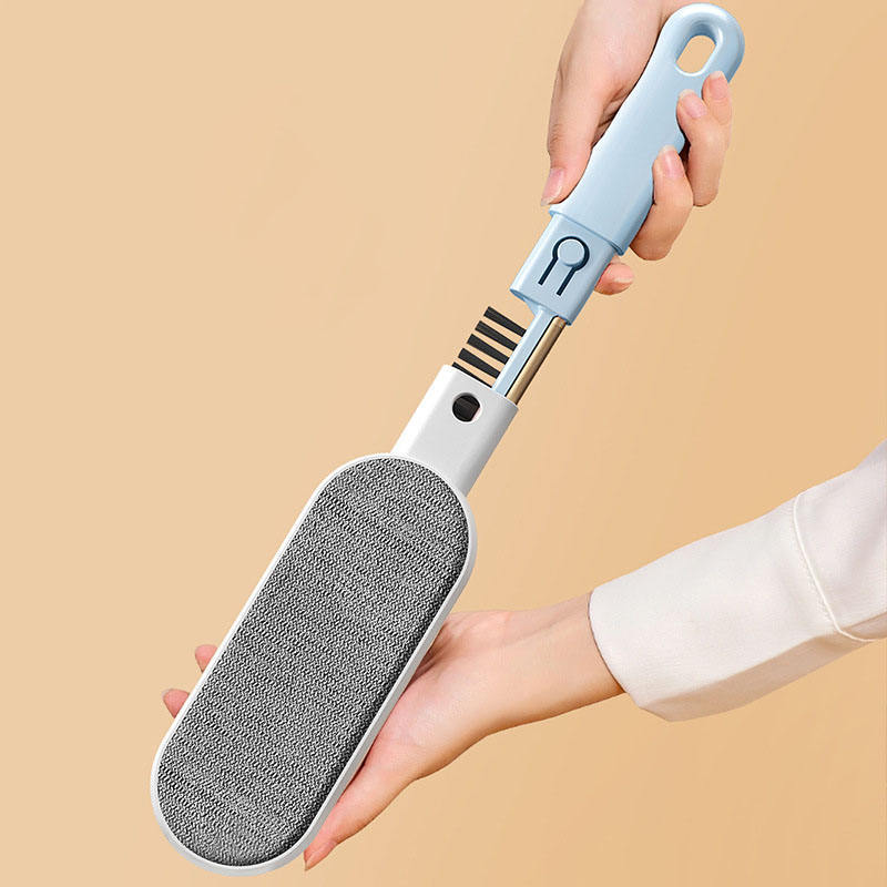 Pet Hair Removal Brush cleaning cat hair from clothes