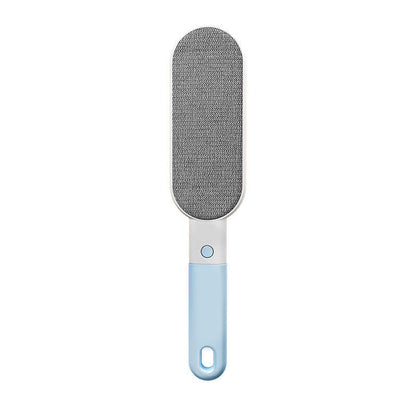 Pet Hair Removal Brush cleaning cat hair from clothes